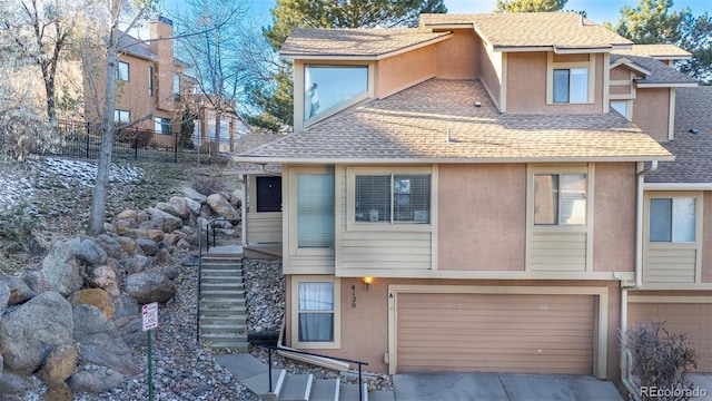 view of front of property featuring a garage