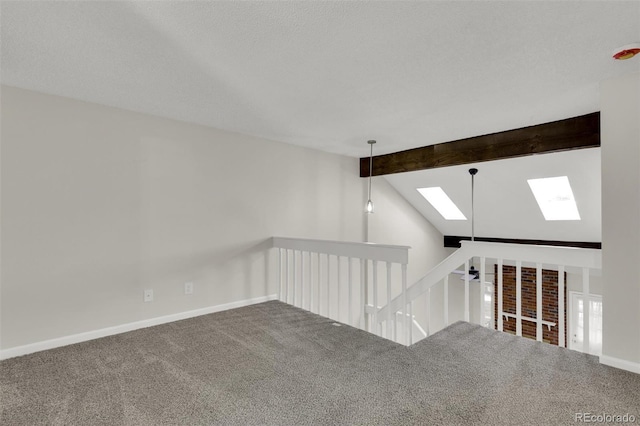 14243 E Radcliff Cir, Aurora, CO 80015 - carpeted spare room featuring a skylight and baseboards