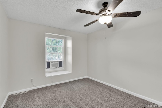 14243 E Radcliff Cir, Aurora, CO 80015 - empty room featuring carpet, cooling unit, a textured ceiling, and ceiling fan