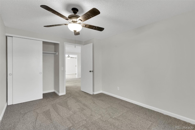 14243 E Radcliff Cir, Aurora, CO 80015 - unfurnished bedroom with carpet floors, a closet, a textured ceiling, and ceiling fan