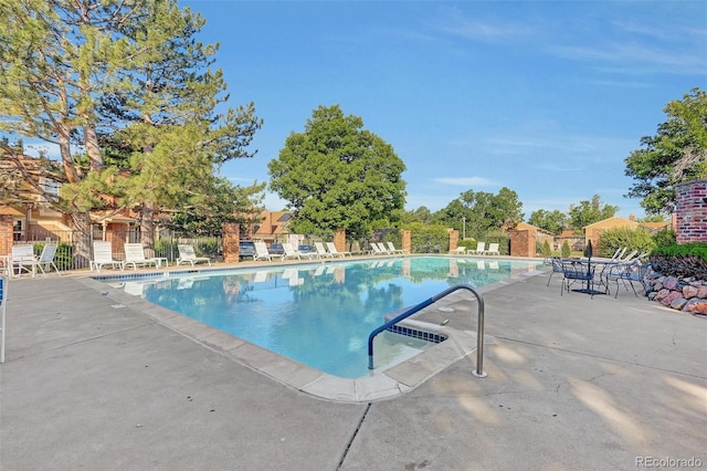 14243 E Radcliff Cir, Aurora, CO 80015 - community pool featuring a patio