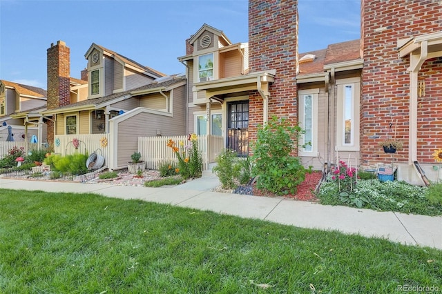 14243 E Radcliff Cir, Aurora, CO 80015 - view of front of home with a chimney