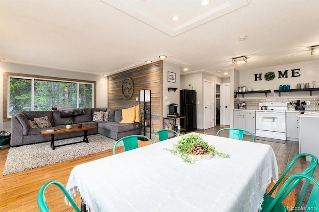 159 Lake Rd, Idaho Springs, CO 80452 - dining area with wood finished floors, recessed lighting, and ornamental molding