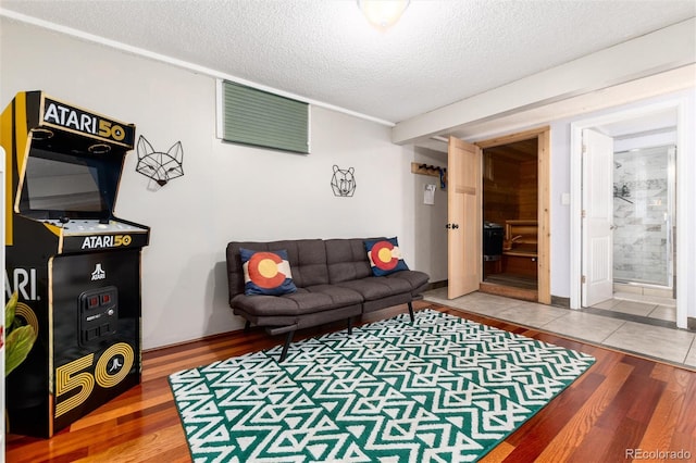 159 Lake Rd, Idaho Springs, CO 80452 - living room with wood finished floors and a textured ceiling