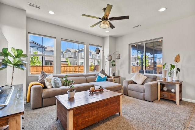 27893 E 6th Pl, Aurora, CO 80018 - living area with ceiling fan, recessed lighting, and baseboards