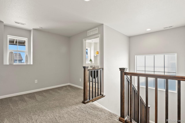 27893 E 6th Pl, Aurora, CO 80018 - unfurnished room featuring carpet flooring, baseboards, and recessed lighting