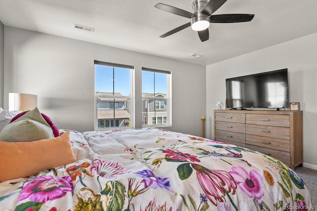 27893 E 6th Pl, Aurora, CO 80018 - carpeted bedroom featuring a ceiling fan