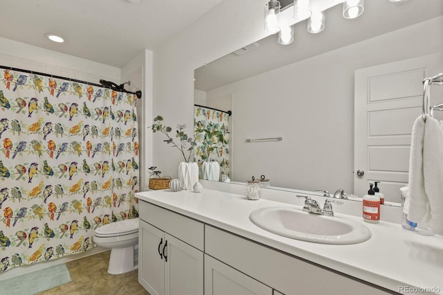27893 E 6th Pl, Aurora, CO 80018 - bathroom featuring toilet, vanity, curtained shower, and tile patterned floors