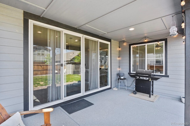 27893 E 6th Pl, Aurora, CO 80018 - view of patio featuring a grill