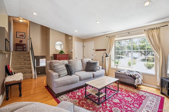 19061 E Oxford Dr, Aurora, CO 80013 - living area with light wood-style floors, stairway, recessed lighting, and lofted ceiling