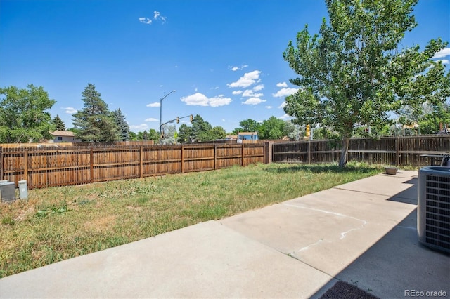 19061 E Oxford Dr, Aurora, CO 80013 - fenced backyard with a patio area