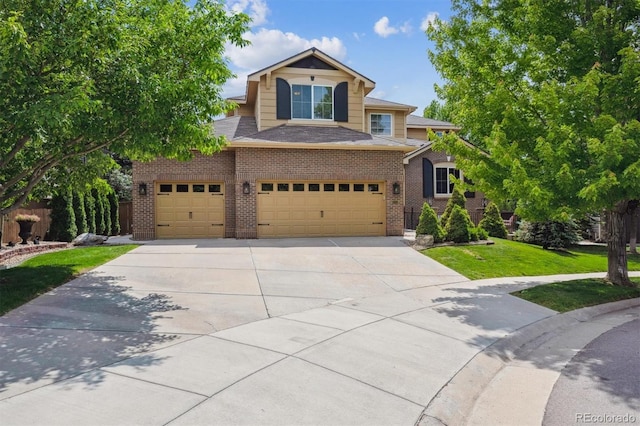 10258 Pennington Ln, Highlands Ranch, CO 80126 - traditional-style house featuring brick siding, driveway, a front yard, and an attached garage