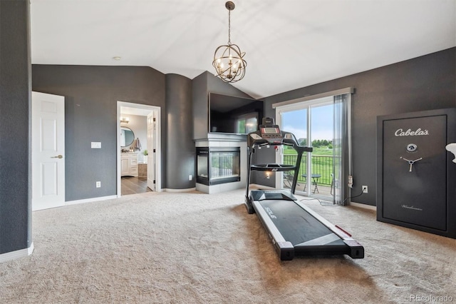 10258 Pennington Ln, Highlands Ranch, CO 80126 - workout area featuring carpet, vaulted ceiling, and a chandelier