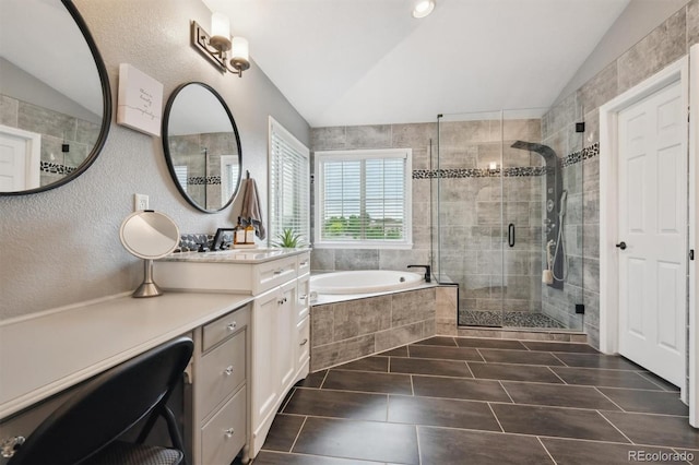10258 Pennington Ln, Highlands Ranch, CO 80126 - full bath with vaulted ceiling, a garden tub, vanity, a shower stall, and a textured wall