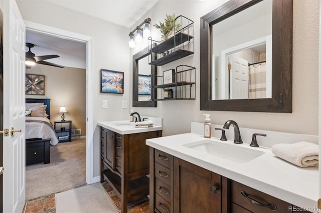 10258 Pennington Ln, Highlands Ranch, CO 80126 - ensuite bathroom featuring two vanities and ceiling fan