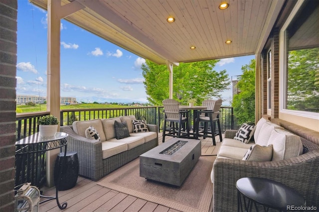 10258 Pennington Ln, Highlands Ranch, CO 80126 - deck with an outdoor living space with a fire pit