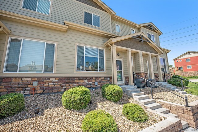 1732 Aspen Meadows Cir, Federal Heights, CO 80260 - view of front of property featuring stone siding and a porch