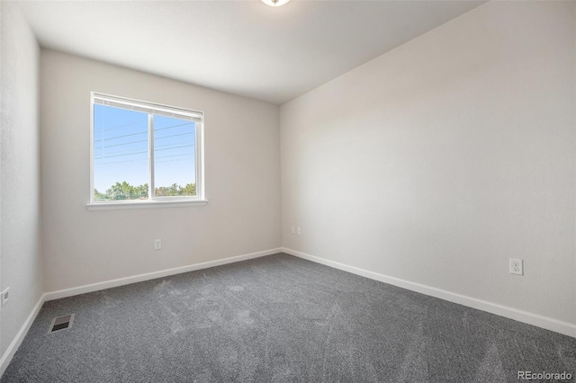 1732 Aspen Meadows Cir, Federal Heights, CO 80260 - unfurnished room with dark carpet and baseboards