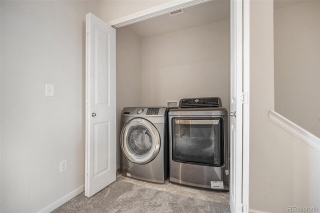 1732 Aspen Meadows Cir, Federal Heights, CO 80260 - laundry area featuring washer and clothes dryer and carpet floors