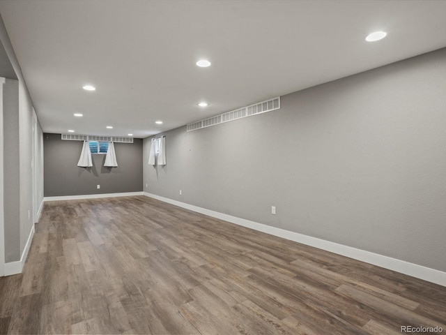 6943 Oak Way, Arvada, CO 80004 - basement featuring recessed lighting and wood finished floors