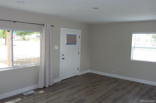 3575 W 9th Ave, Denver, CO 80204 - entryway with wood finished floors and baseboards