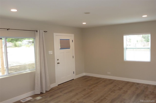 3575 W 9th Ave, Denver, CO 80204 - foyer entrance with wood finished floors and recessed lighting