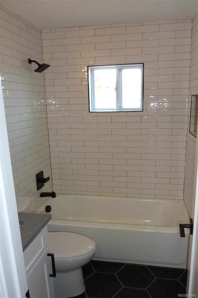 3575 W 9th Ave, Denver, CO 80204 - full bathroom with tile patterned floors, vanity, and  shower combination