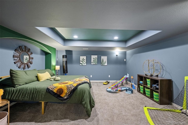 10649 Mt Emerald Dr, Peyton, CO 80831 - bedroom with a raised ceiling, carpet flooring, baseboards, and recessed lighting