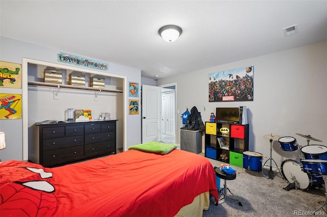 10649 Mt Emerald Dr, Peyton, CO 80831 - bedroom featuring carpet and a closet