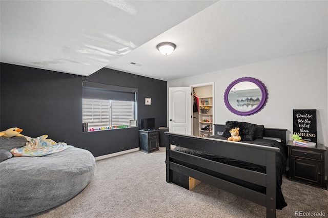 10649 Mt Emerald Dr, Peyton, CO 80831 - bedroom with carpet floors, baseboards, and a walk in closet