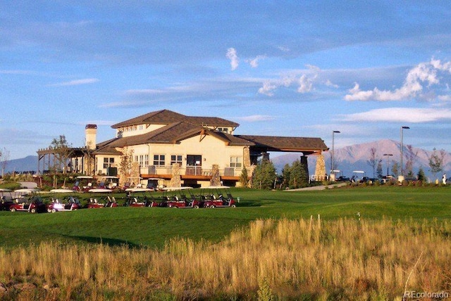 10649 Mt Emerald Dr, Peyton, CO 80831 - rear view of house featuring a mountain view