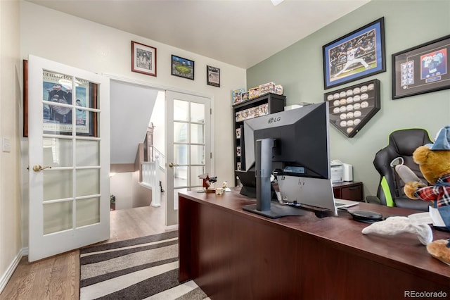 office space featuring wood finished floors and french doors