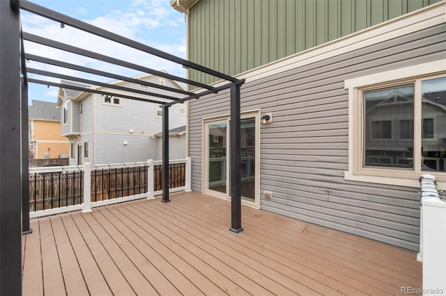 wooden deck with a pergola