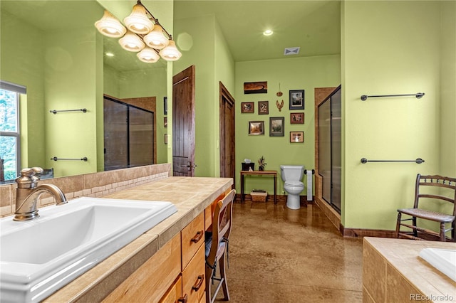17595 Black Forest Rd, Colorado Springs, CO 80908 - full bathroom with vanity, a shower with shower door, tiled bath, and a chandelier