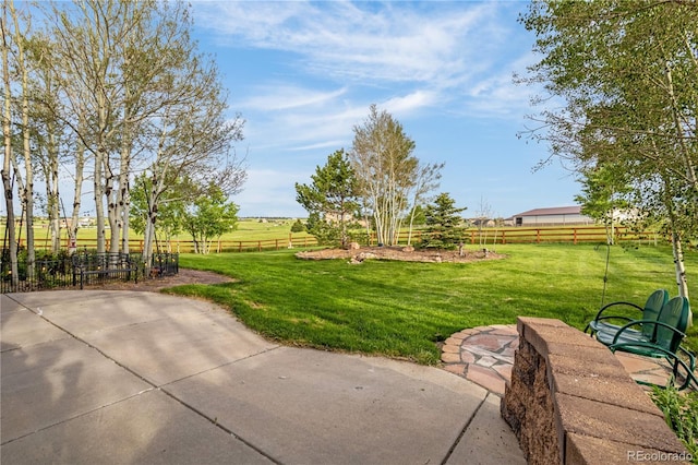 17595 Black Forest Rd, Colorado Springs, CO 80908 - view of yard featuring a view of countryside and a patio