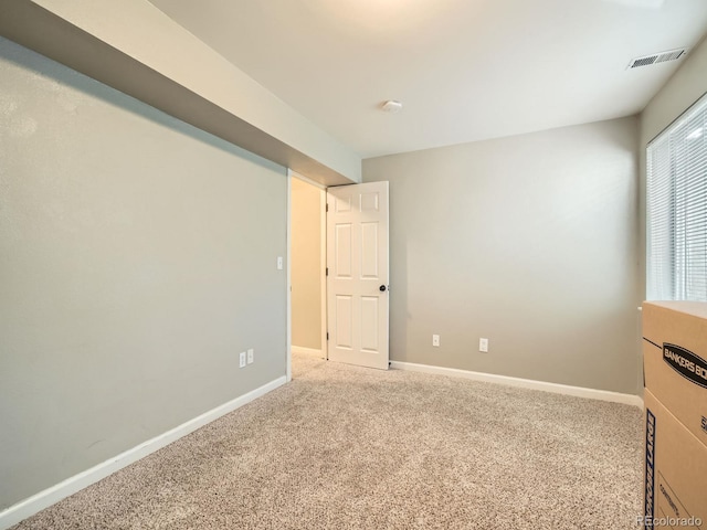 view of carpeted spare room