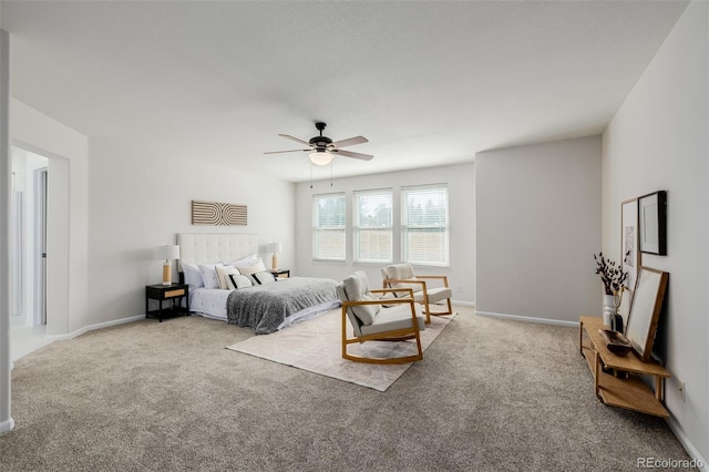 bedroom with carpet flooring, baseboards, and ceiling fan