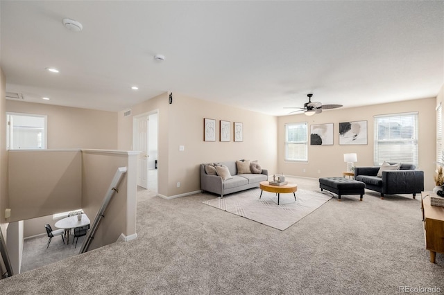 carpeted living room with plenty of natural light, recessed lighting, baseboards, and ceiling fan