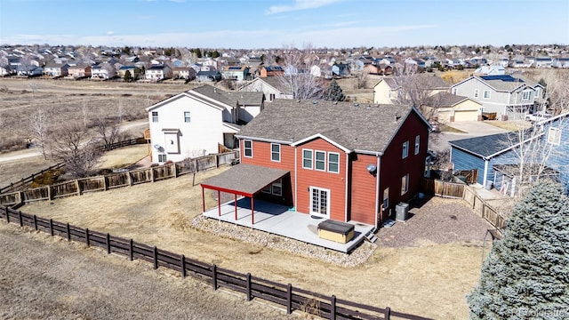 drone / aerial view with a residential view