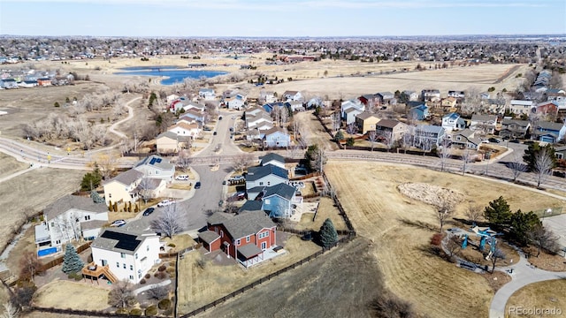 birds eye view of property with a residential view