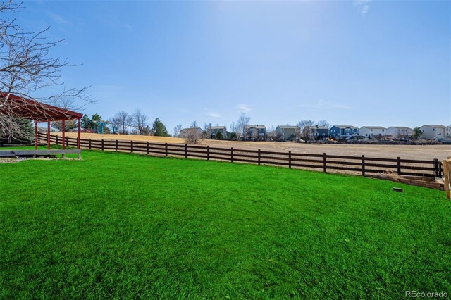 view of yard featuring fence