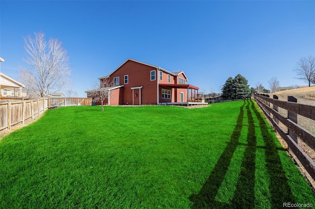 view of yard featuring a fenced backyard