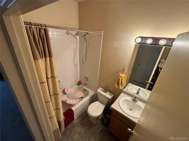 2874 Rose Hill St, Strasburg, CO 80136 - bathroom featuring a textured wall, vanity, and shower / bathtub combination with curtain