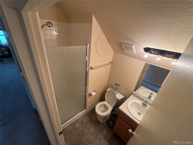 2874 Rose Hill St, Strasburg, CO 80136 - full bath with a stall shower, vanity, a textured ceiling, and stone finish floors