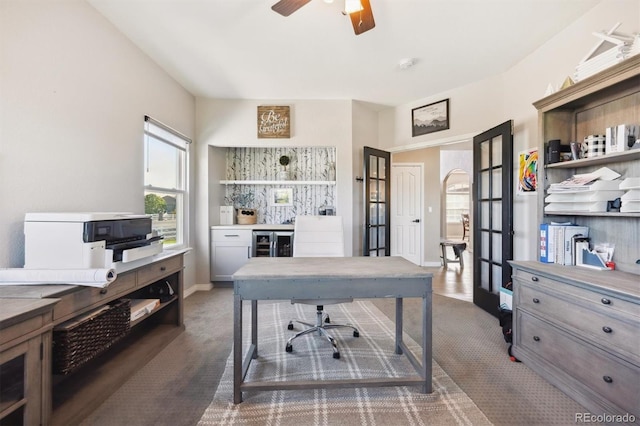 14953 Akron Ct, Brighton, CO 80602 - carpeted home office with ceiling fan, beverage cooler, french doors, and baseboards