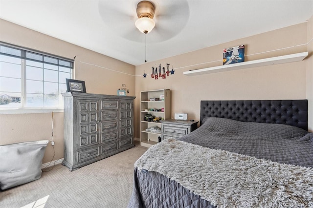 14953 Akron Ct, Brighton, CO 80602 - bedroom featuring light colored carpet, baseboards, and ceiling fan