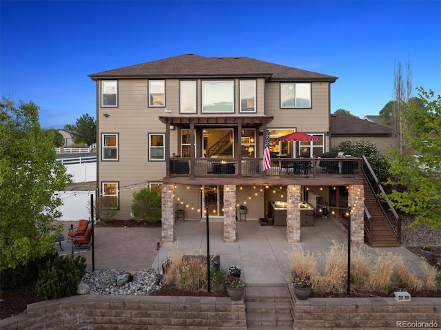 14953 Akron Ct, Brighton, CO 80602 - rear view of property with a patio, stairs, fence, and a wooden deck