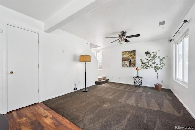 4435 Andes Ct, Denver, CO 80249 - unfurnished room with ceiling fan, stairs, and baseboards