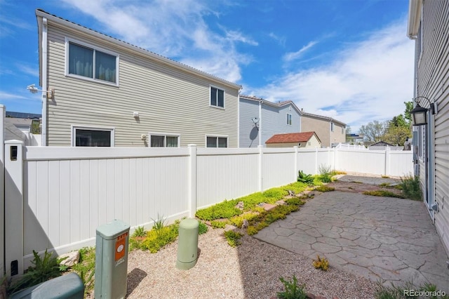4435 Andes Ct, Denver, CO 80249 - fenced backyard featuring a patio