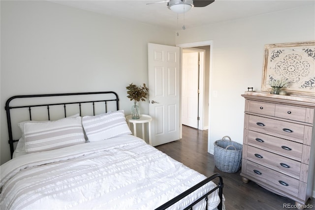 bedroom with baseboards, a ceiling fan, and dark wood-style flooring